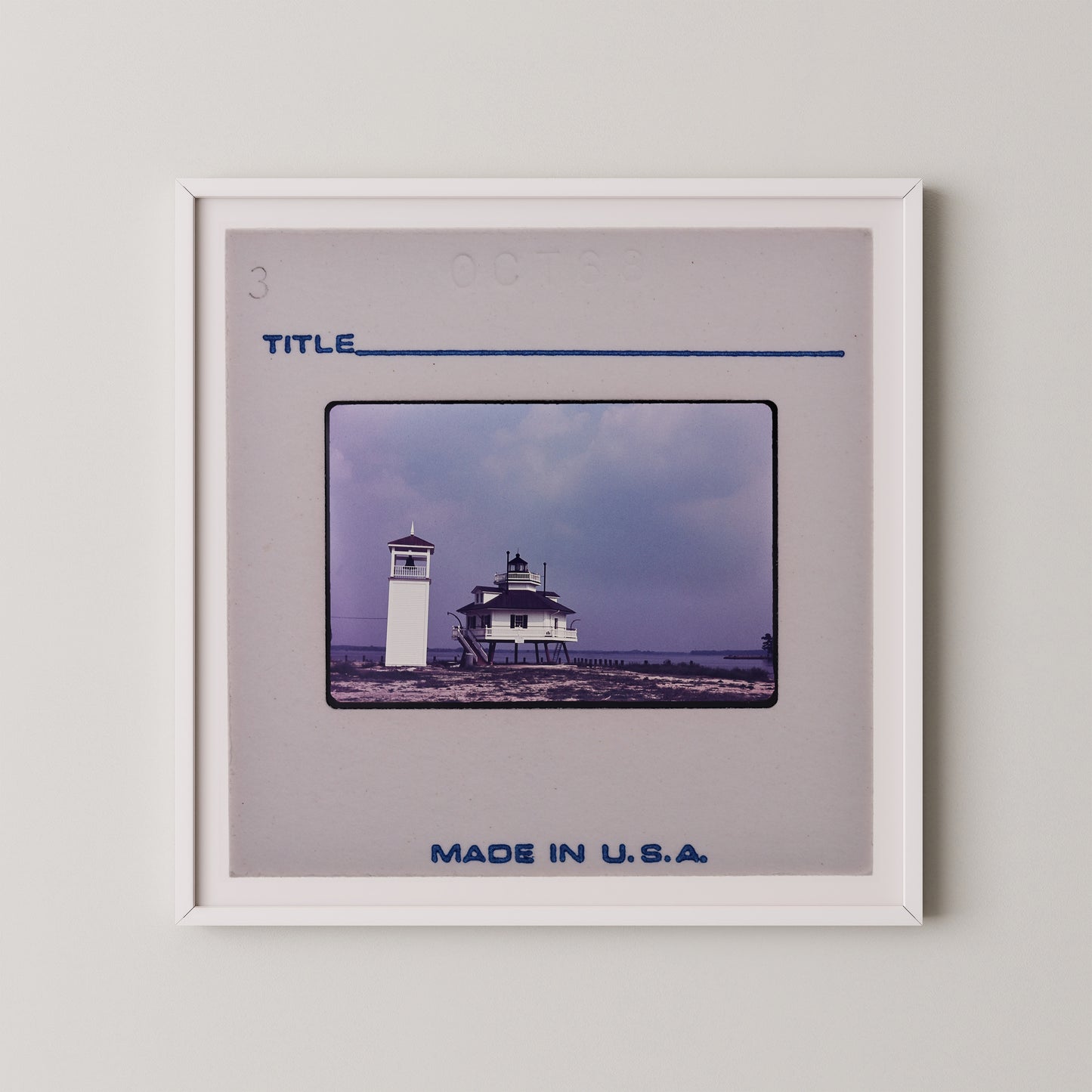 The image is a framed photograph of a lighthouse, with the caption "Title" and "Made in U.S.A."