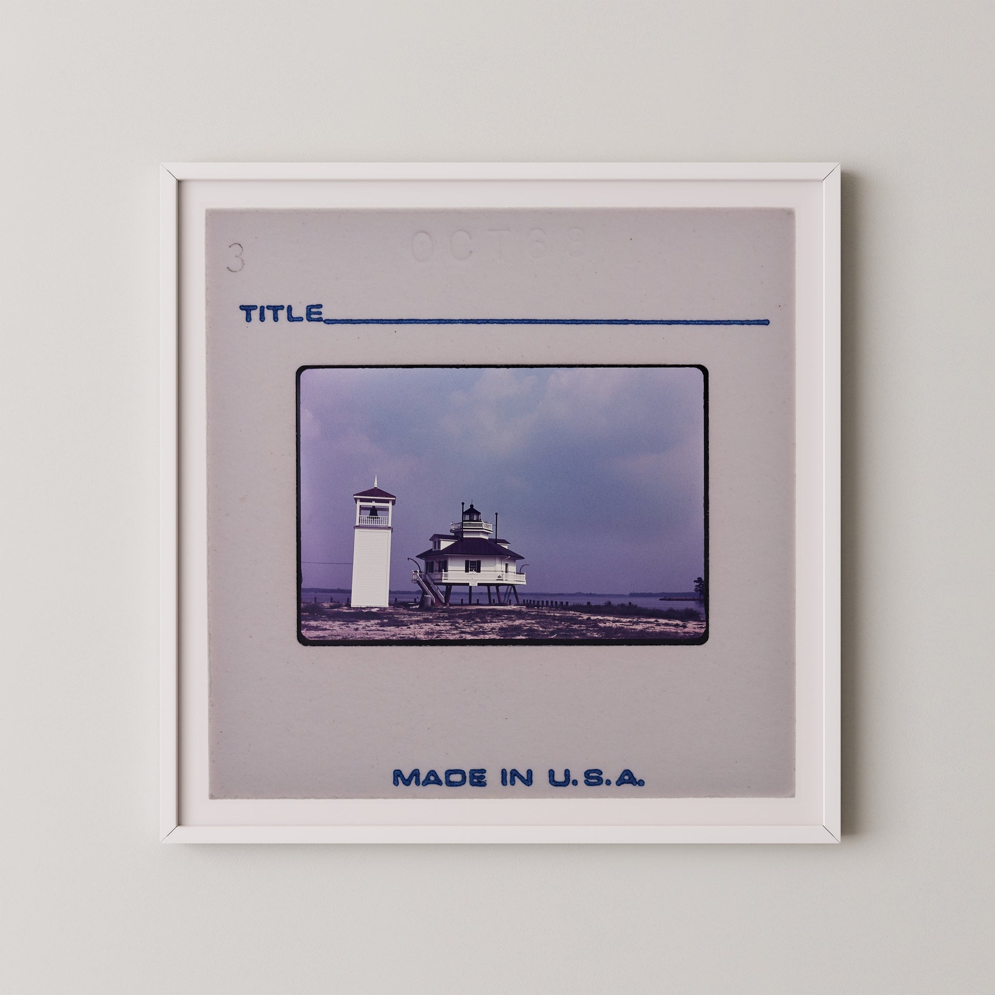 The image is a framed photograph of a lighthouse, with the caption "Title" and "Made in U.S.A."