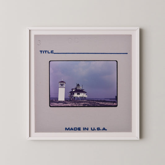 The image is a framed photograph of a lighthouse, with the caption "Title" and "Made in U.S.A."