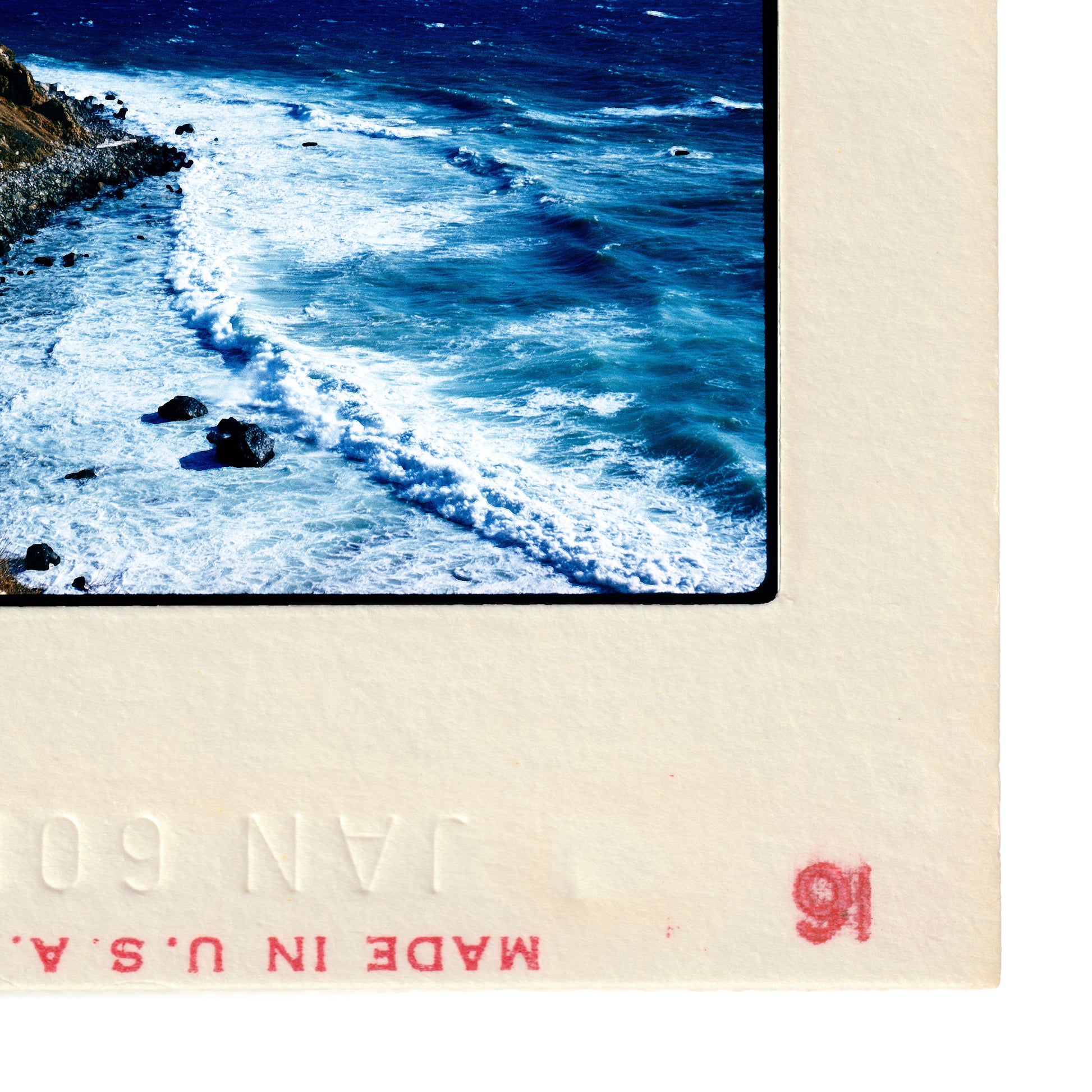 a rocky coastline with crashing waves, and the number '91' is visible in the bottom right corner.