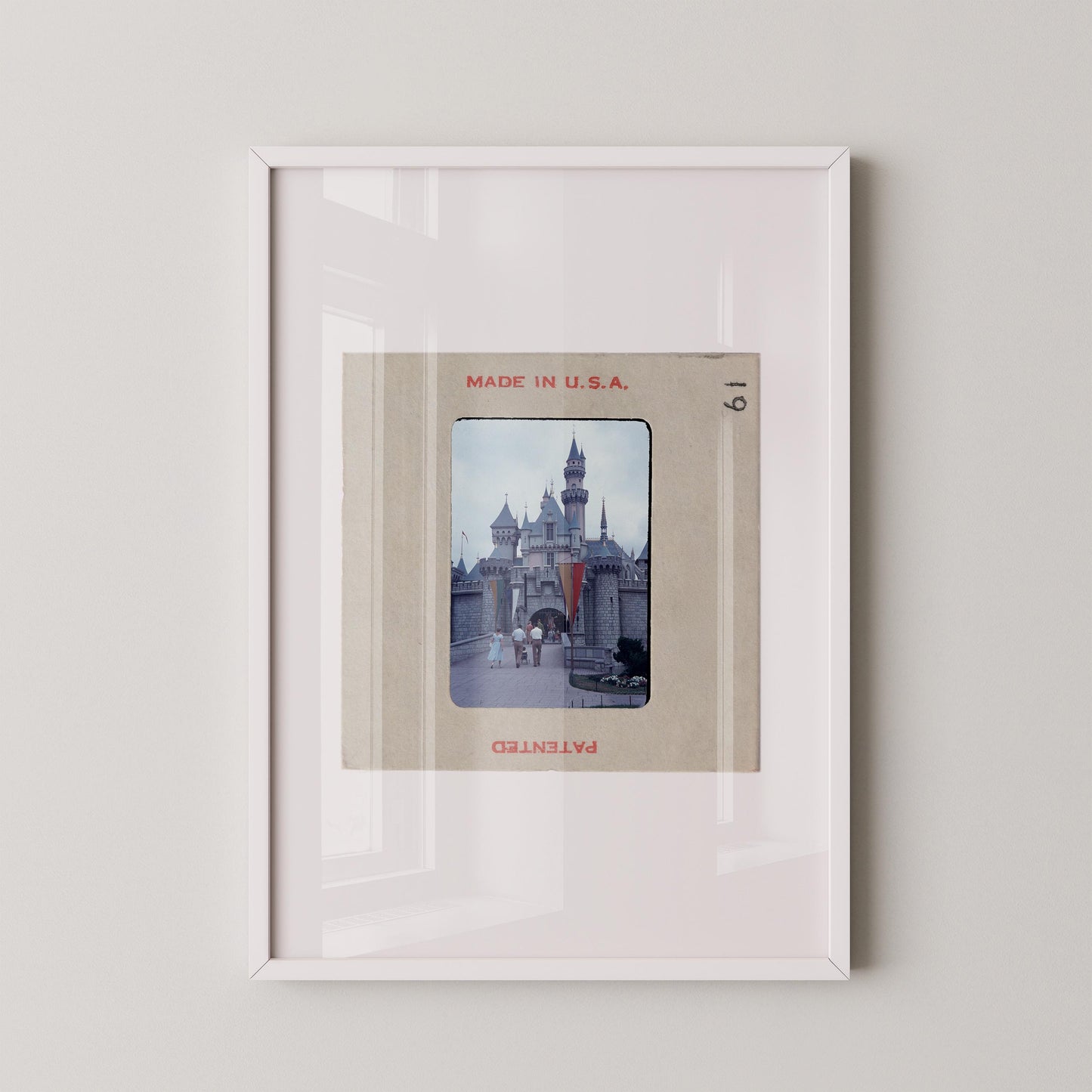 The image is a framed photograph of a castle, with the text "MADE IN U.S.A." printed on the frame.