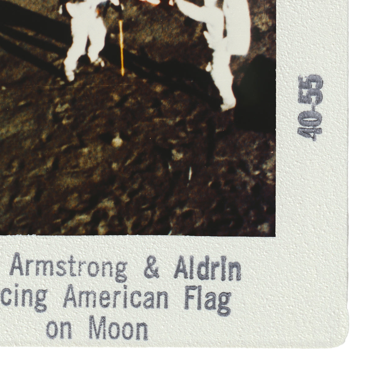 Armstrong & Aldrin are capturing the American Flag on the Moon.