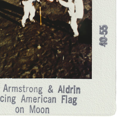 Armstrong & Aldrin are capturing the American Flag on the Moon.