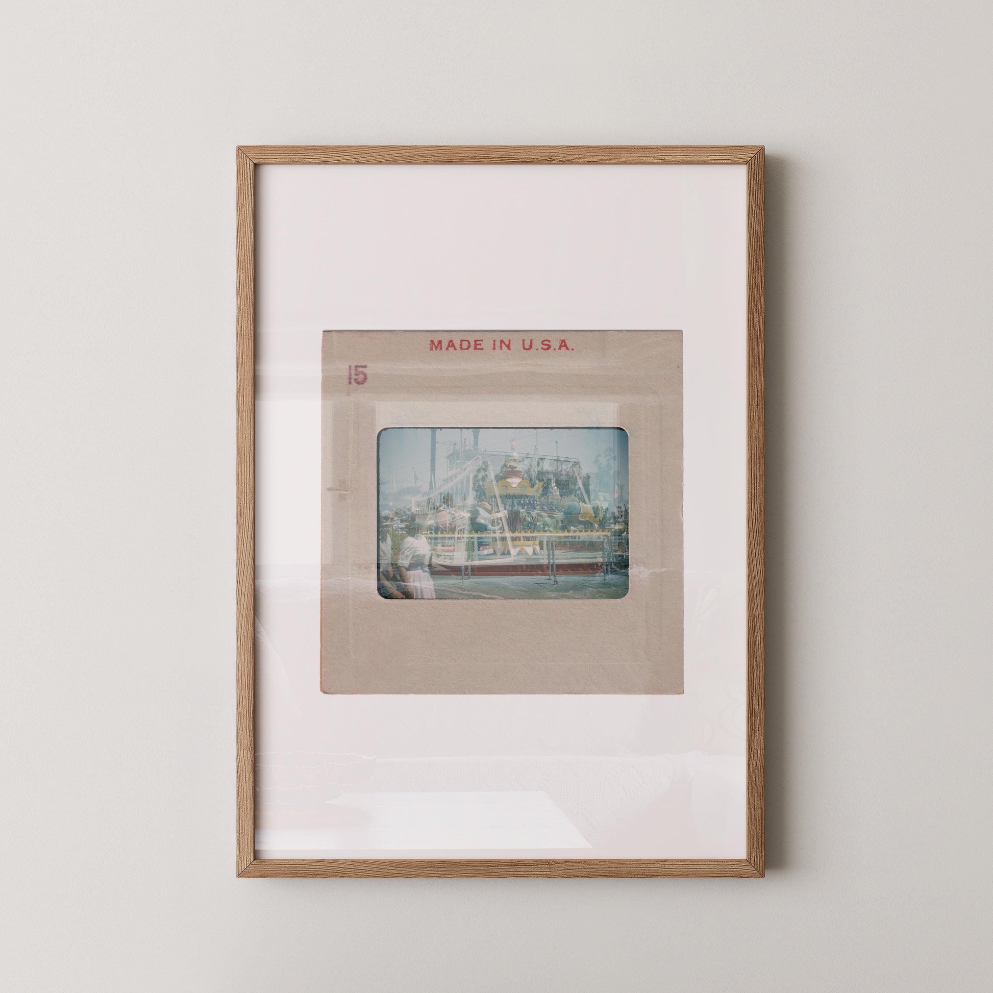 The image is a framed photograph of a building, likely in the United States, with the text "MADE IN U.S.A." printed on the frame.