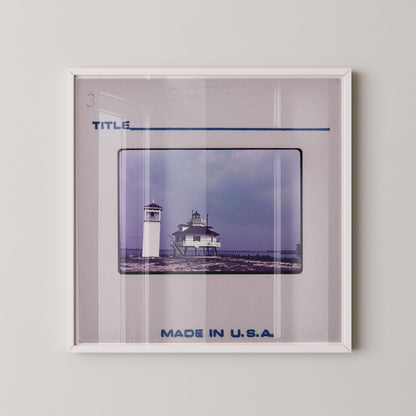 The image is a framed photograph of a lighthouse, with the text "TITLE" and "MADE IN U.S.A." displayed on the frame.