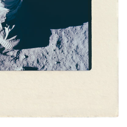 a close-up view of a lunar surface, with visible craters and rocky terrain.