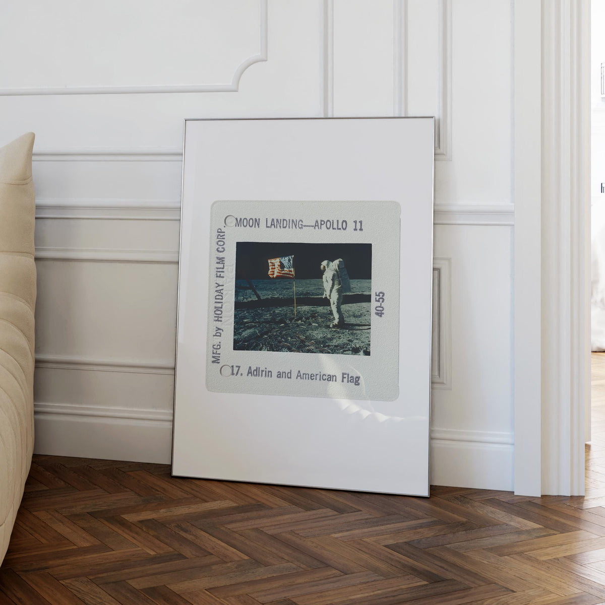 a framed photograph of the Apollo 11 moon landing, with the text "Moon Landing—Apollo 11" and "Adrin and American Flag" printed on it.
